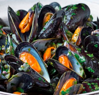 Mussels with salsa verde and olive oil chips